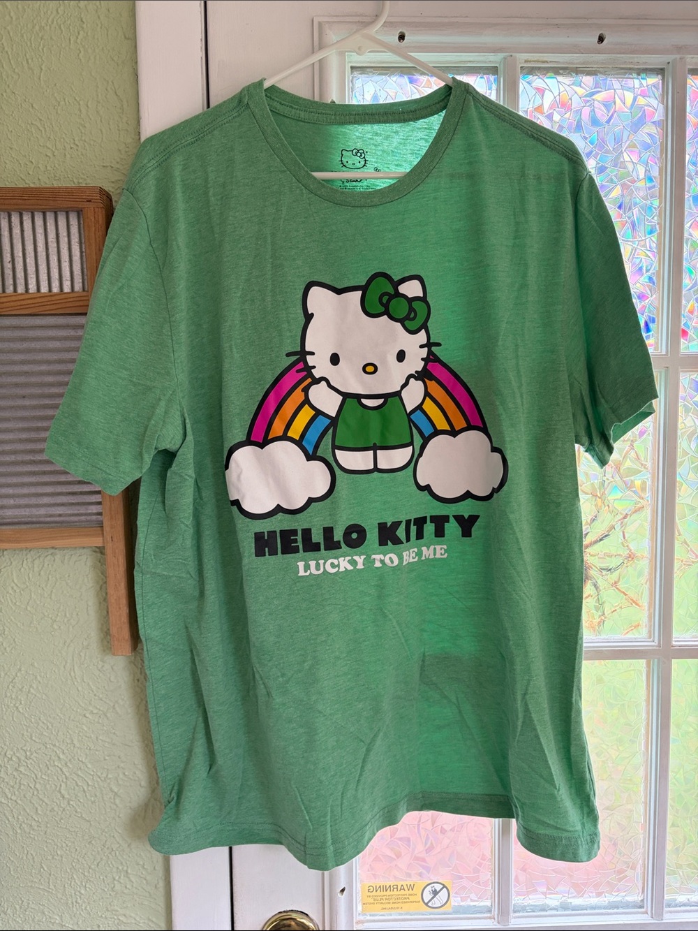 Hello Kitty Green Graphic Tee with Rainbow Motif